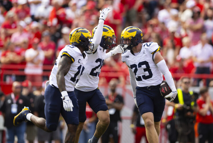No. 21 Michigan uses 3 long TD runs to beat Nebraska 30-27, extend Huskers' skid against Top 25 foes